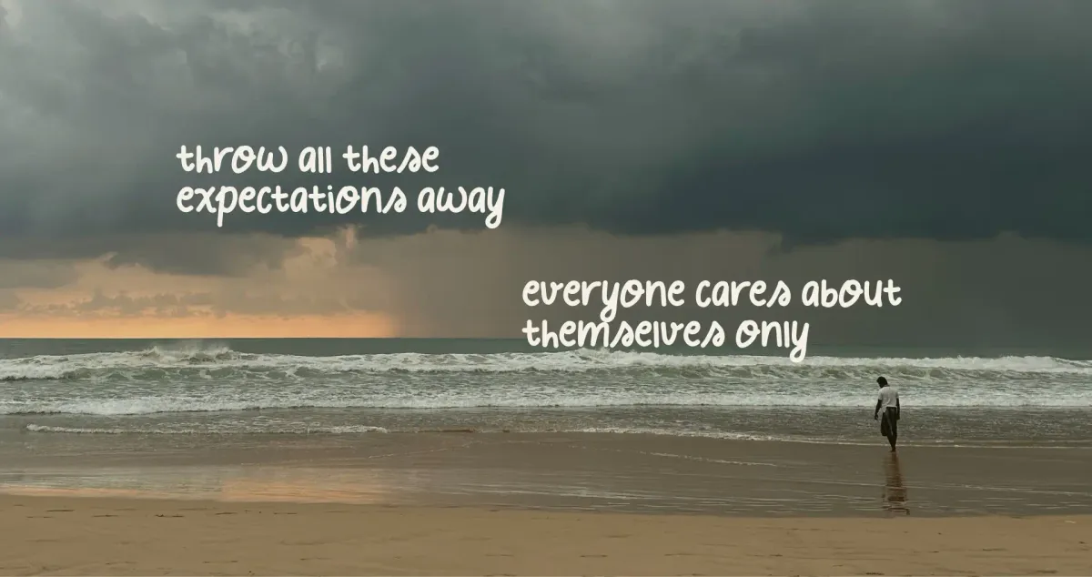 Waves crashing on the Indian ocean beach. The storm is gathering as the sky turns dark.