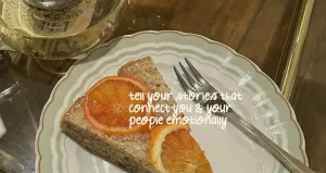 A close-up of the orange cake on a plate.